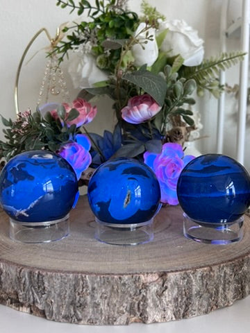 Indonesian Blue Amber Spheres 64, 51b, 56