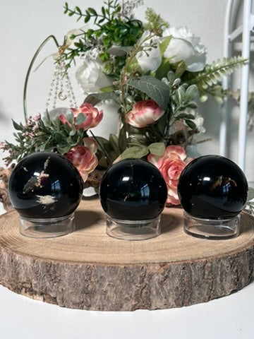 Indonesian Blue Amber Spheres 64, 51b, 56